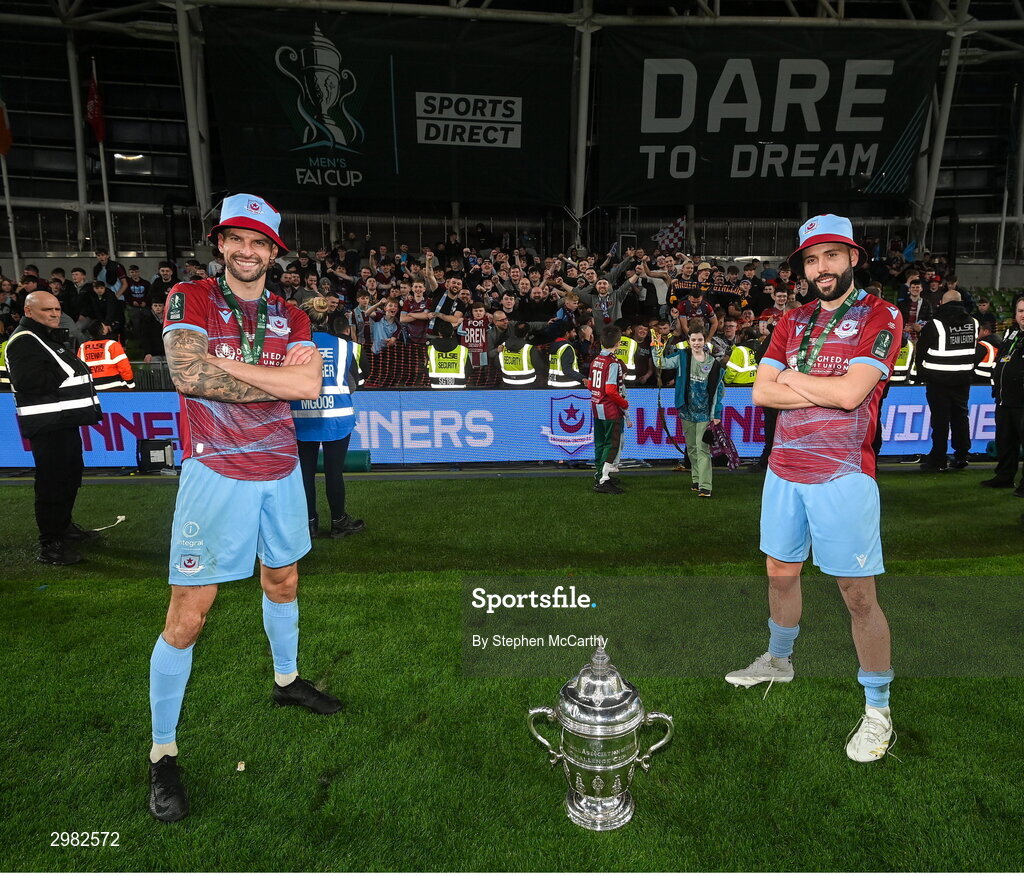 10 November 2024; Drogheda United players Adam Foley, left, and Dave Webster celebrate with the FAI cup after the Sports Direct Men's FAI Cup Final match between Drogheda United and Derry City at the Aviva Stadium in Dublin. Photo by Stephen McCarthy/Sportsfile