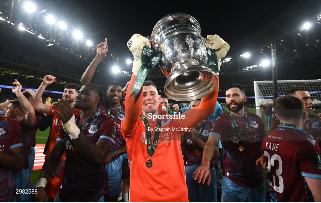 10 November 2024; Drogheda United goalkeeper Luke Dennison celebrates with the FAI cup after the Sports Direct Men's FAI Cup Final match between Drogheda United and Derry City at the Aviva Stadium in Dublin. Photo by Stephen McCarthy/Sportsfile