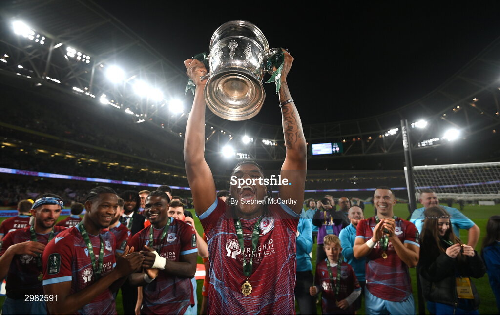10 November 2024; Harper Bailey of Drogheda United  celebrates with the FAI cup after the Sports Direct Men's FAI Cup Final match between Drogheda United and Derry City at the Aviva Stadium in Dublin. Photo by Stephen McCarthy/Sportsfile