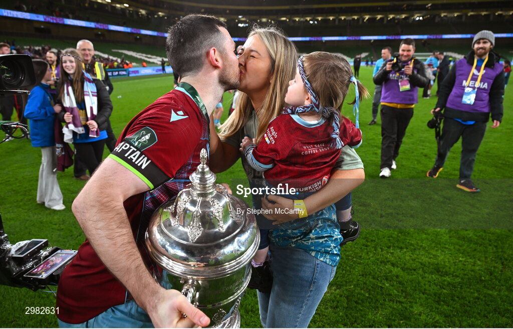 10 November 2024; Ryan Brennan of Drogheda United with Stephanie Kirwan and Blathnaid Brennan, age 18 months, and the FAI cup after the Sports Direct Men's FAI Cup Final match between Drogheda United and Derry City at the Aviva Stadium in Dublin. Photo by Stephen McCarthy/Sportsfile