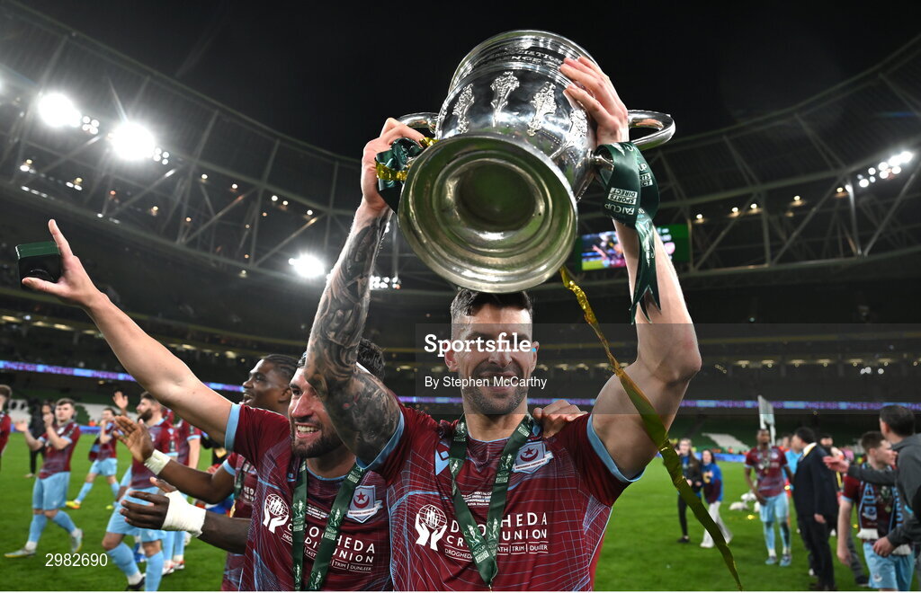10 November 2024; Luke Heeney, left, and Adam Foley of Drogheda United celebrate with the cup after the Sports Direct Men's FAI Cup Final match between Drogheda United and Derry City at the Aviva Stadium in Dublin. Photo by Stephen McCarthy/Sportsfile