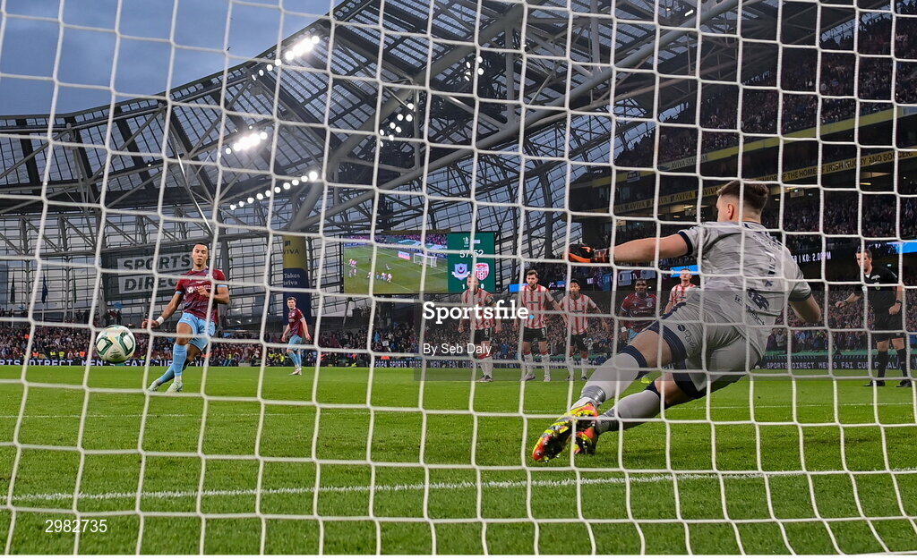 10 November 2024; Douglas James-Taylor of Drogheda United scores his side's second goal from a penalty, past Derry City goalkeeper Brian Maher, during the Sports Direct Men's FAI Cup Final match between Drogheda United and Derry City at the Aviva Stadium in Dublin. Photo by Seb Daly/Sportsfile