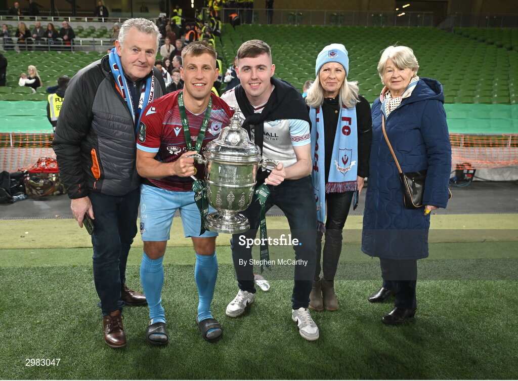10 November 2024; Matthew O'Brien of Drogheda United celebrates with the FAI Cup and family after the Sports Direct Men's FAI Cup Final match between Drogheda United and Derry City at the Aviva Stadium in Dublin. Photo by Stephen McCarthy/Sportsfile