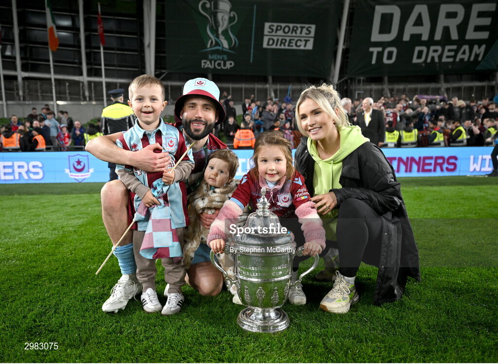 10 November 2024; Dave Webster of Drogheda United celebrates with the FAI Cup and family after the Sports Direct Men's FAI Cup Final match between Drogheda United and Derry City at the Aviva Stadium in Dublin. Photo by Stephen McCarthy/Sportsfile