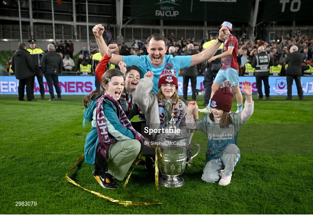 10 November 2024; Drogheda United assistant manager Daire Doyle and family celebrate with the FAI Cup after the Sports Direct Men's FAI Cup Final match between Drogheda United and Derry City at the Aviva Stadium in Dublin. Photo by Stephen McCarthy/Sportsfile