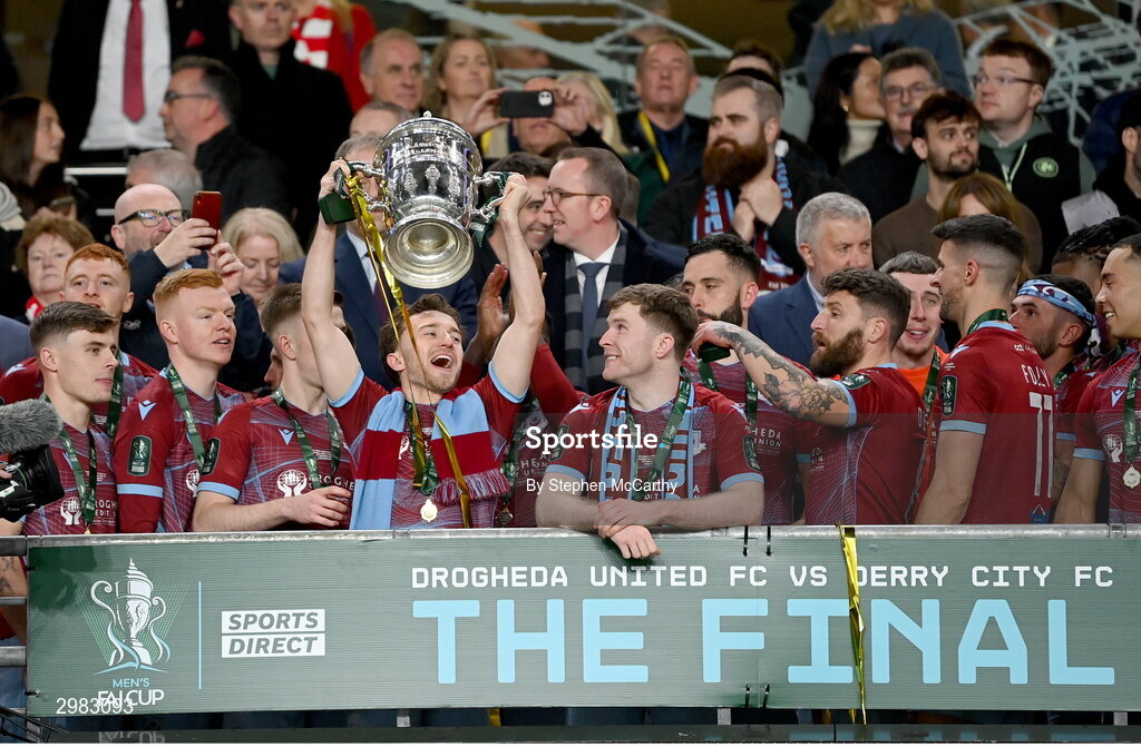 10 November 2024; Darragh Markey of Drogheda United lifts the FAI Cup after the Sports Direct Men's FAI Cup Final match between Drogheda United and Derry City at the Aviva Stadium in Dublin. Photo by Stephen McCarthy/Sportsfile