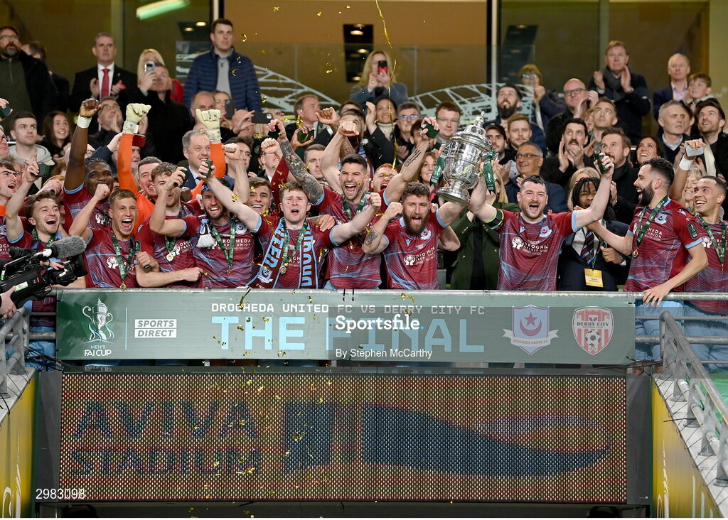 10 November 2024; Drogheda United's Gary Deegan and Ryan Brennan lift the FAI Cup after the Sports Direct Men's FAI Cup Final match between Drogheda United and Derry City at the Aviva Stadium in Dublin. Photo by Stephen McCarthy/Sportsfile