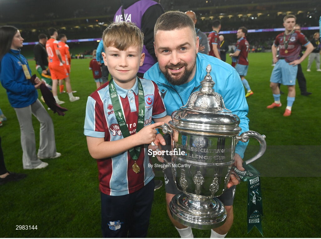 10 November 2024; Drogheda United's Tiarnan Mulvenna celebrates with the FAI Cup after the Sports Direct Men's FAI Cup Final match between Drogheda United and Derry City at the Aviva Stadium in Dublin. Photo by Stephen McCarthy/Sportsfile