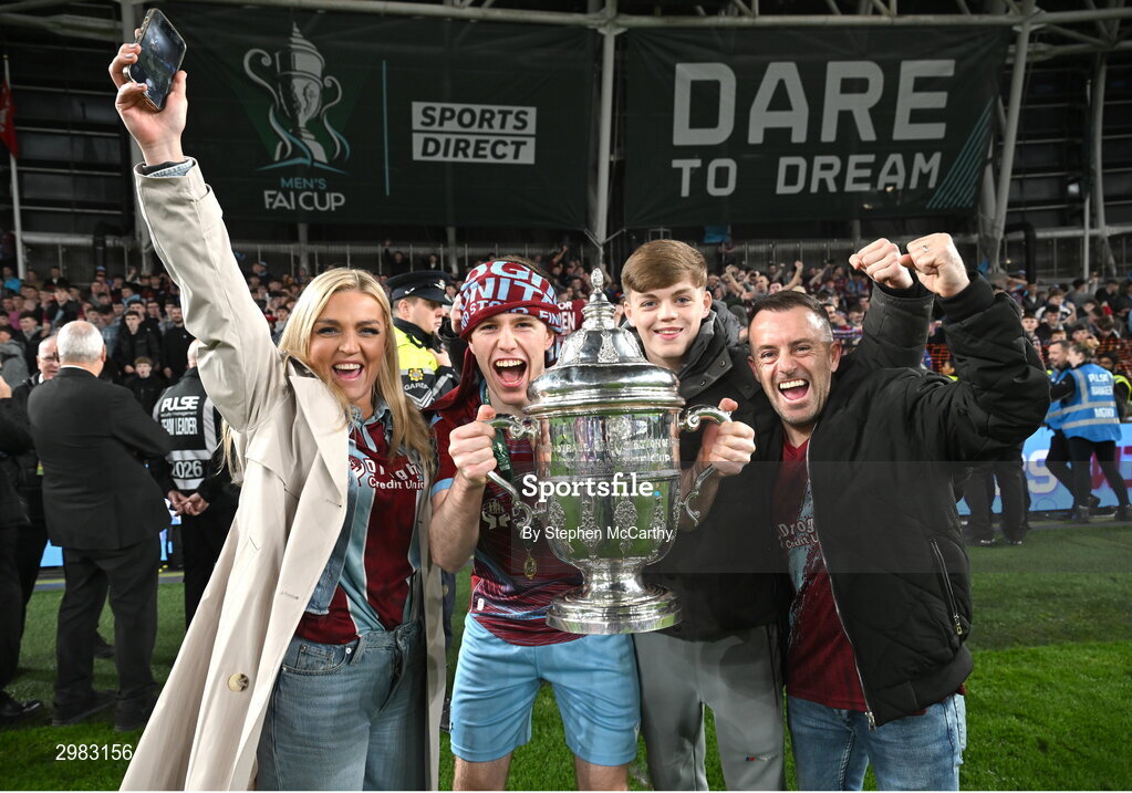 10 November 2024; Warren Davis of Drogheda United celebrates with the FAI Cup and family after the Sports Direct Men's FAI Cup Final match between Drogheda United and Derry City at the Aviva Stadium in Dublin. Photo by Stephen McCarthy/Sportsfile