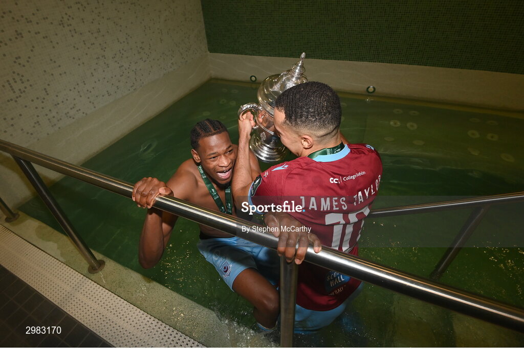10 November 2024; Drogheda United's Elicha Ahui, left, and Douglas James-Taylor celebrate with the FAI Cup after the Sports Direct Men's FAI Cup Final match between Drogheda United and Derry City at the Aviva Stadium in Dublin. Photo by Stephen McCarthy/Sportsfile