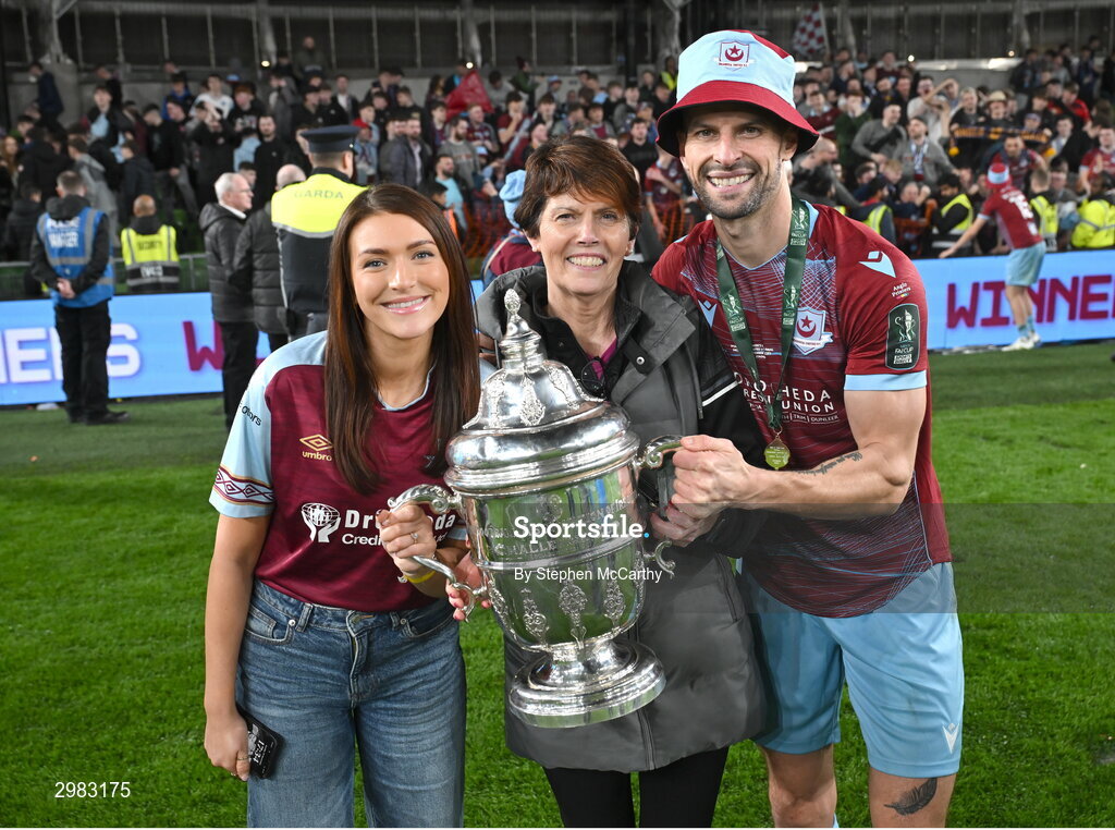 10 November 2024; Adam Foley of Drogheda United celebrates with the FAI Cup and family after the Sports Direct Men's FAI Cup Final match between Drogheda United and Derry City at the Aviva Stadium in Dublin. Photo by Stephen McCarthy/Sportsfile