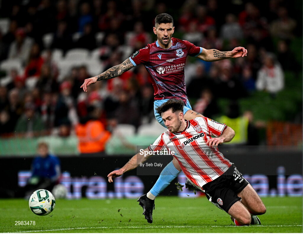 10 November 2024; Adam Foley of Drogheda United in action against Adam O'Reilly of Derry City during the Sports Direct Men's FAI Cup Final match between Drogheda United and Derry City at the Aviva Stadium in Dublin. Photo by Seb Daly/Sportsfile
