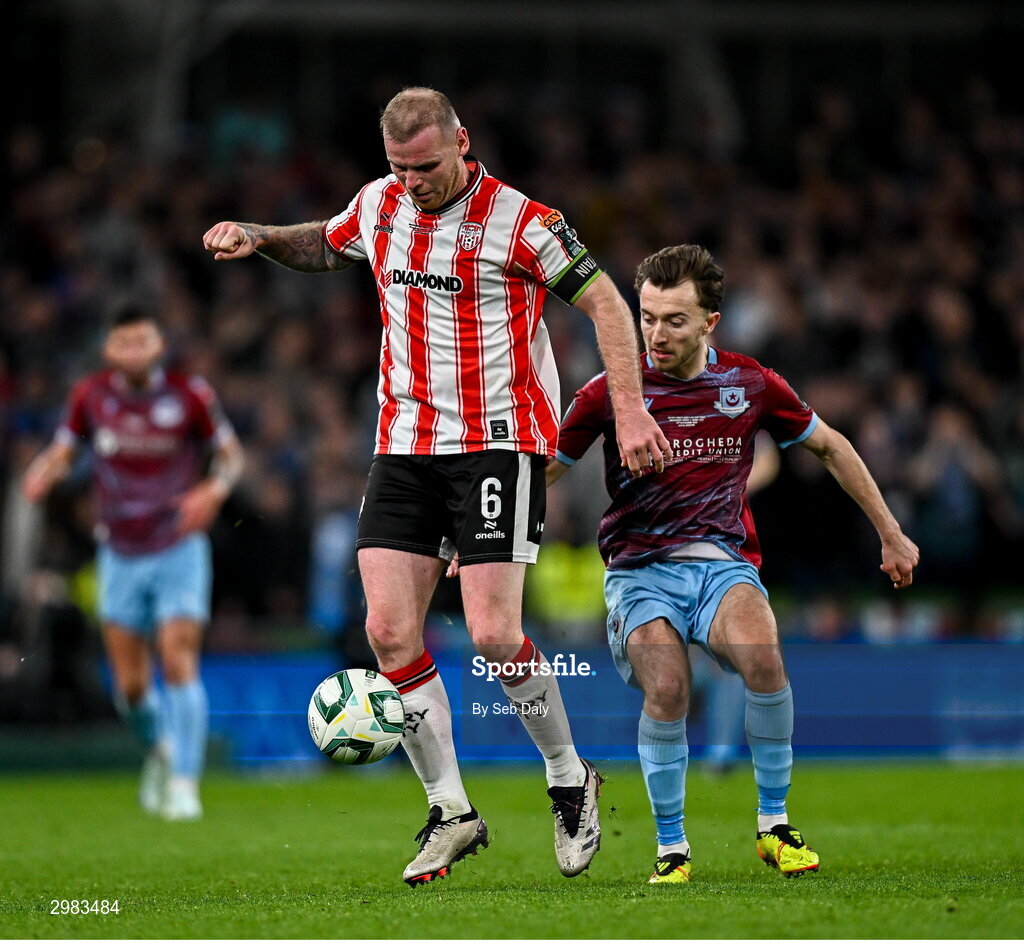 10 November 2024; Mark Connolly of Derry City in action against Darragh Markey of Drogheda United during the Sports Direct Men's FAI Cup Final match between Drogheda United and Derry City at the Aviva Stadium in Dublin. Photo by Seb Daly/Sportsfile
