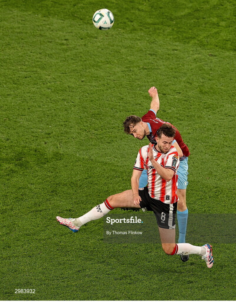 10 November 2024; Will Patching of Derry City in action against Andrew Quinn of Drogheda United during the Sports Direct Men's FAI Cup Final match between Drogheda United and Derry City at the Aviva Stadium in Dublin. Photo by Thomas Flinkow/Sportsfile