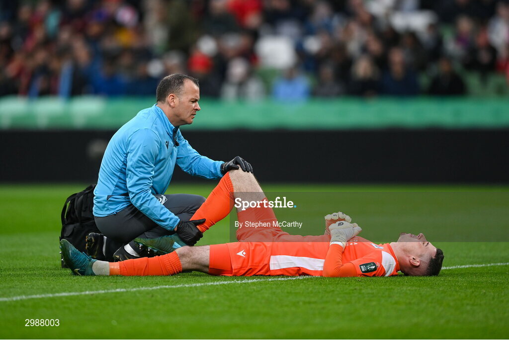 10 November 2024; Drogheda United physiotherapist Keith Browne attends to goalkeeper Luke Dennison during the Sports Direct Men's FAI Cup Final match between Drogheda United and Derry City at the Aviva Stadium in Dublin. Photo by Stephen McCarthy/Sportsfile