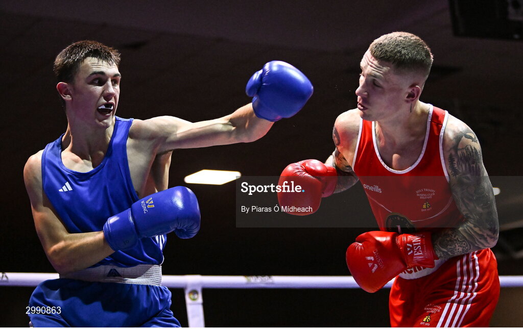 13 November 2024; Luke Hall of Olympic BC Mullingar, left, in action against Joseph McArdle of Holy Trinity Belfast during the 67kg quarter-final bout at the IABA National Elite Boxing Championships 2025 Finals at the National Boxing Stadium in Dublin. Photo by Piaras Ó Mídheach/Sportsfile