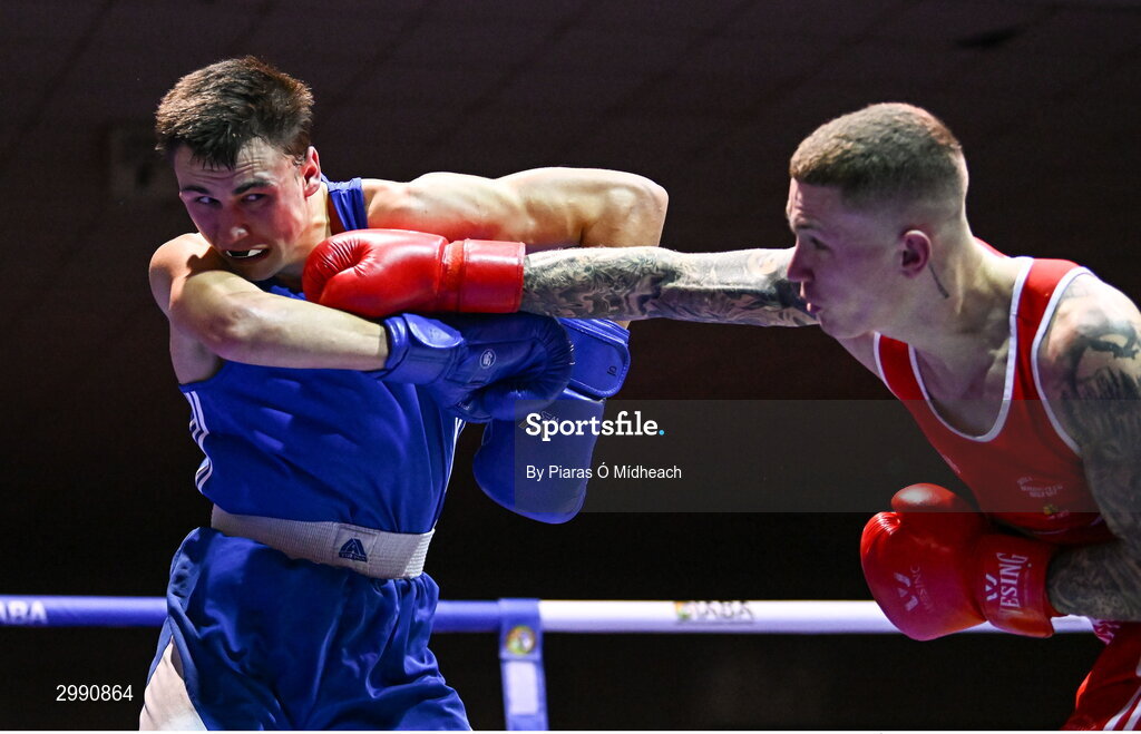 13 November 2024; Luke Hall of Olympic BC Mullingar, left, in action against Joseph McArdle of Holy Trinity Belfast during the 67kg quarter-final bout at the IABA National Elite Boxing Championships 2025 Finals at the National Boxing Stadium in Dublin. Photo by Piaras Ó Mídheach/Sportsfile