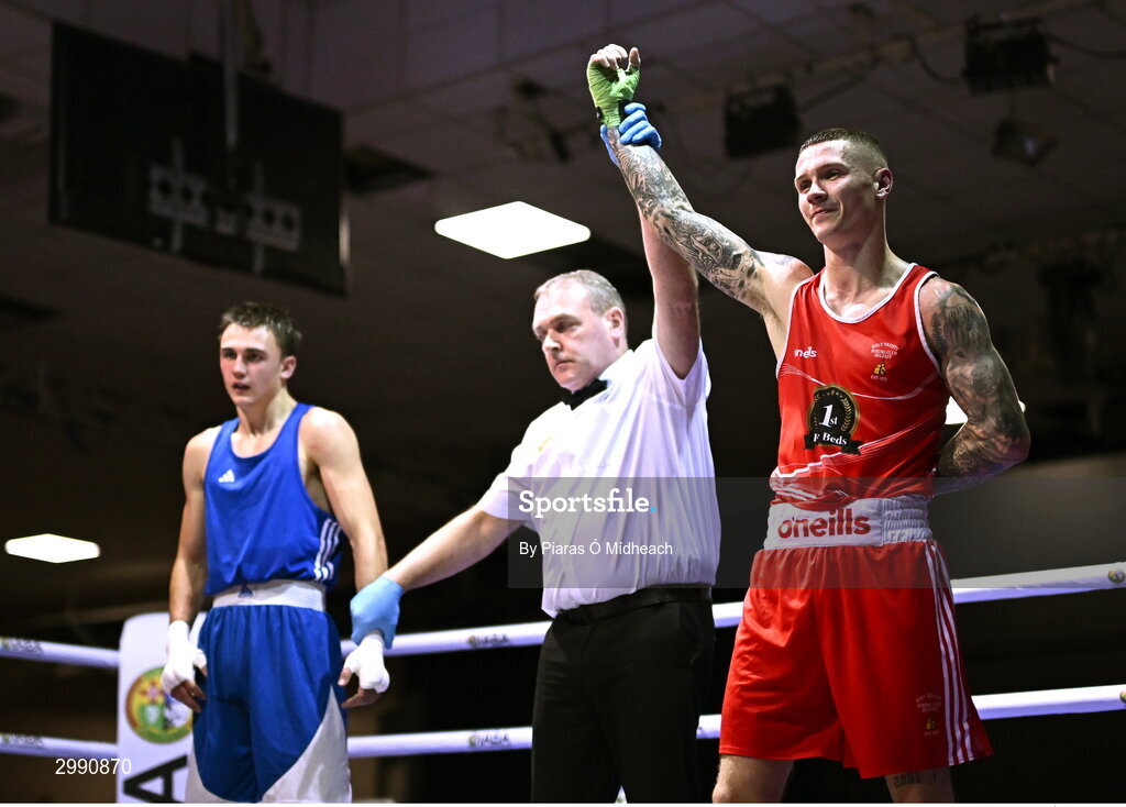 13 November 2024; Joseph McArdle of Holy Trinity Belfast, right, is declared victorious over Luke Hall of Olympic BC Mullingar after their 67kg quarter-final bout at the IABA National Elite Boxing Championships 2025 Finals at the National Boxing Stadium in Dublin. Photo by Piaras Ó Mídheach/Sportsfile