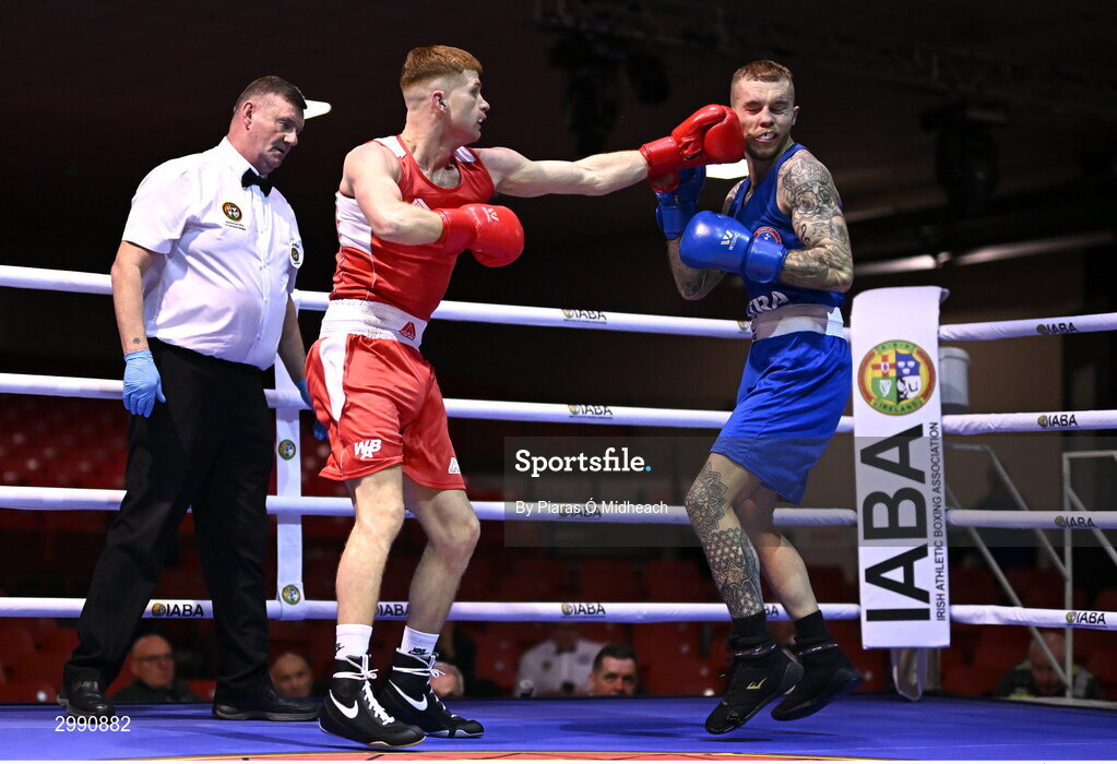 13 November 2024; James McDonagh of St Paul's BC Waterford, left, in action against Damien Creavin of Olympic BC Galway during the 67kg quarter-final bout at the IABA National Elite Boxing Championships 2025 Finals at the National Boxing Stadium in Dublin. Photo by Piaras Ó Mídheach/Sportsfile