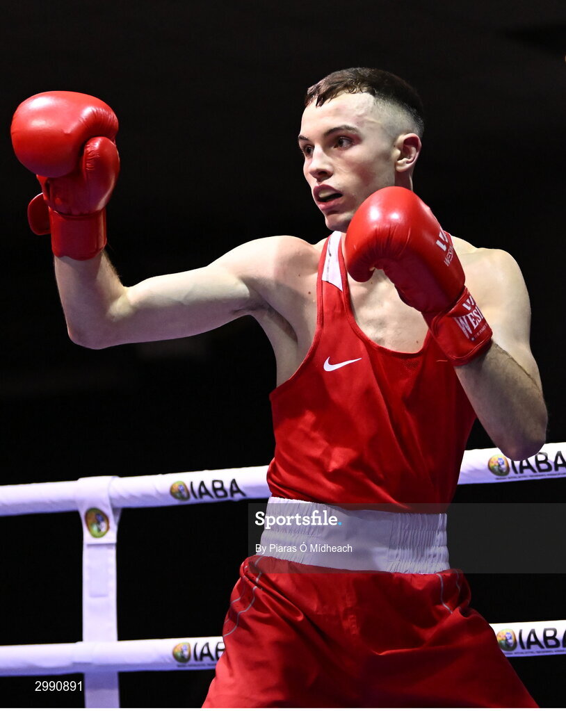 13 November 2024; Cian Cramer of Cabra Boxing Club, Dublin, in action against Malo Davis of Monkstown BC, Dublin, during the 67kg quarter-final bout at the IABA National Elite Boxing Championships 2025 Finals at the National Boxing Stadium in Dublin. Photo by Piaras Ó Mídheach/Sportsfile