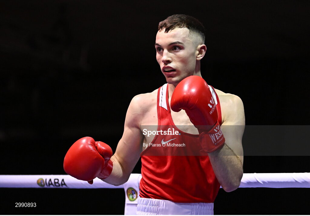 13 November 2024; Cian Cramer of Cabra Boxing Club, Dublin, in action against Malo Davis of Monkstown BC, Dublin, during the 67kg quarter-final bout at the IABA National Elite Boxing Championships 2025 Finals at the National Boxing Stadium in Dublin. Photo by Piaras Ó Mídheach/Sportsfile