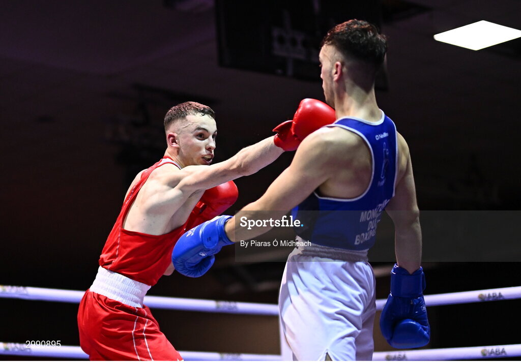 13 November 2024; Cian Cramer of Cabra Boxing Club, Dublin, left, in action against Malo Davis of Monkstown BC, Dublin, during the 67kg quarter-final bout at the IABA National Elite Boxing Championships 2025 Finals at the National Boxing Stadium in Dublin. Photo by Piaras Ó Mídheach/Sportsfile
