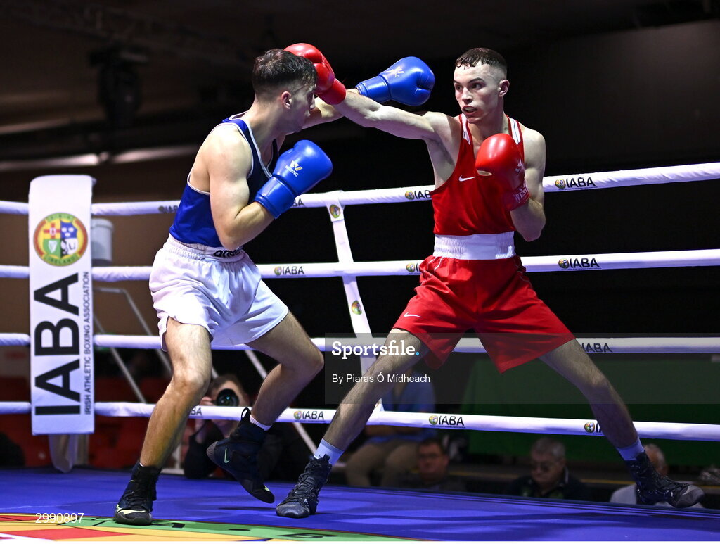 13 November 2024; Cian Cramer of Cabra Boxing Club, Dublin, right, in action against Malo Davis of Monkstown BC, Dublin, during the 67kg quarter-final bout at the IABA National Elite Boxing Championships 2025 Finals at the National Boxing Stadium in Dublin. Photo by Piaras Ó Mídheach/Sportsfile
