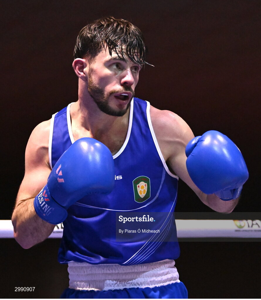 13 November 2024; Eugene McKeever of Holy Family BC Drogheda, Louth, in action against Jon McConnell of Holy Trinity BC Belfast during the 71kg semi-final bout at the IABA National Elite Boxing Championships 2025 Finals at the National Boxing Stadium in Dublin. Photo by Piaras Ó Mídheach/Sportsfile