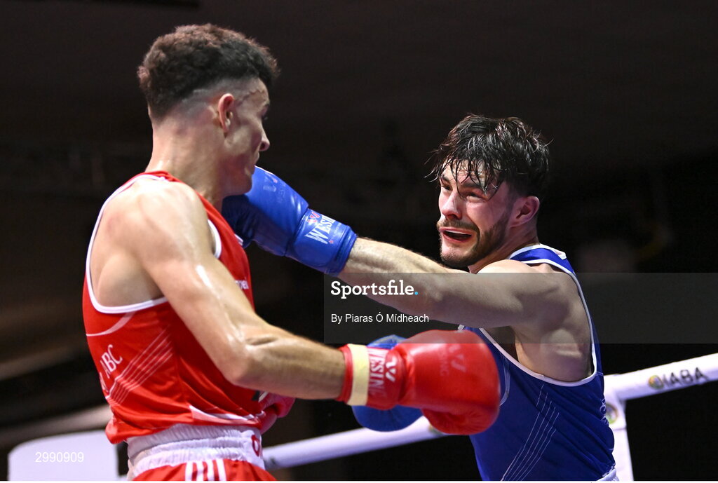 13 November 2024; Eugene McKeever of Holy Family BC Drogheda, Louth, right, in action against Jon McConnell of Holy Trinity BC Belfast during the 71kg semi-final bout at the IABA National Elite Boxing Championships 2025 Finals at the National Boxing Stadium in Dublin. Photo by Piaras Ó Mídheach/Sportsfile