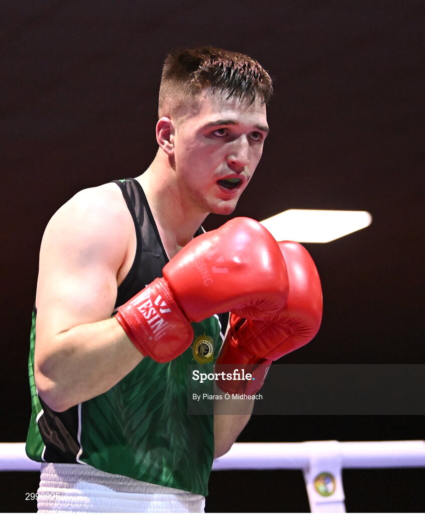 13 November 2024; TJ King of Ballyboughal/Defence Forces in action against Taylor Guiney of St Mary’s BC, Dublin, during the 75kg semi-final bout at the IABA National Elite Boxing Championships 2025 Finals at the National Boxing Stadium in Dublin. Photo by Piaras Ó Mídheach/Sportsfile