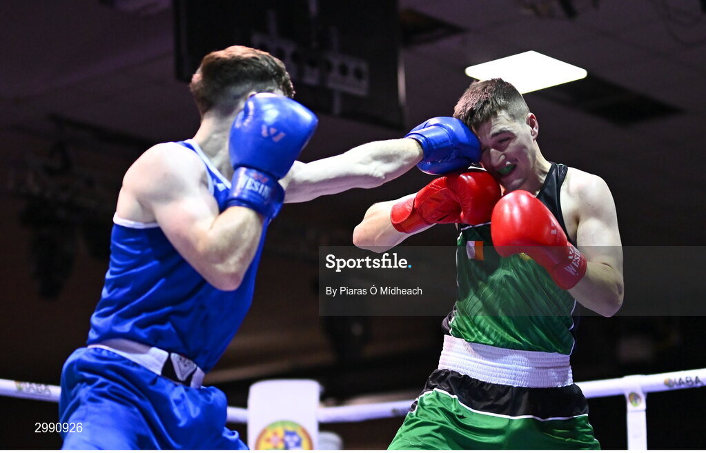 13 November 2024; TJ King of Ballyboughal/Defence Forces, right, in action against Taylor Guiney of St Mary’s BC, Dublin, during the 75kg semi-final bout at the IABA National Elite Boxing Championships 2025 Finals at the National Boxing Stadium in Dublin. Photo by Piaras Ó Mídheach/Sportsfile