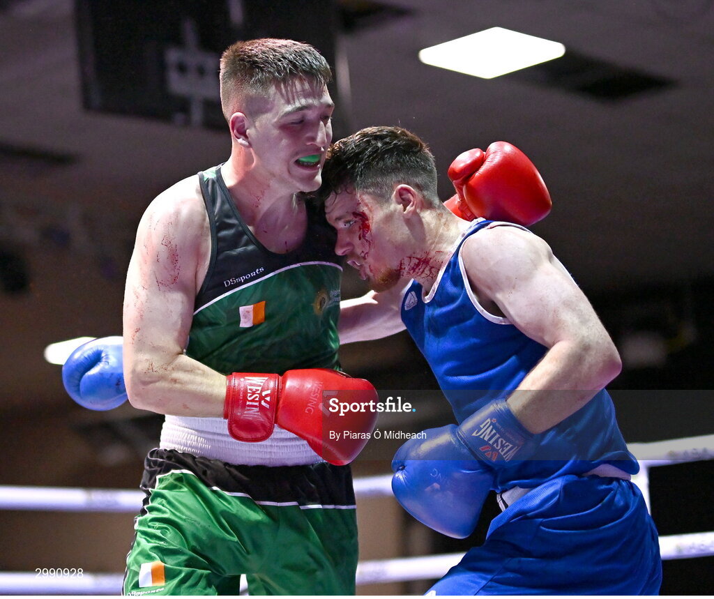 13 November 2024; TJ King of Ballyboughal/Defence Forces, left, in action against Taylor Guiney of St Mary’s BC, Dublin, during the 75kg semi-final bout at the IABA National Elite Boxing Championships 2025 Finals at the National Boxing Stadium in Dublin. Photo by Piaras Ó Mídheach/Sportsfile