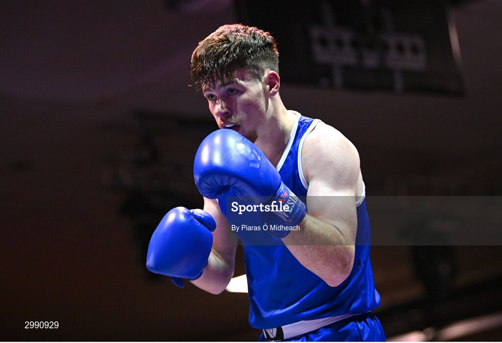 13 November 2024; Taylor Guiney of St Mary’s BC, Dublin, in action against TJ King of Ballyboughal/Defence Forces during the 75kg semi-final bout at the IABA National Elite Boxing Championships 2025 Finals at the National Boxing Stadium in Dublin. Photo by Piaras Ó Mídheach/Sportsfile