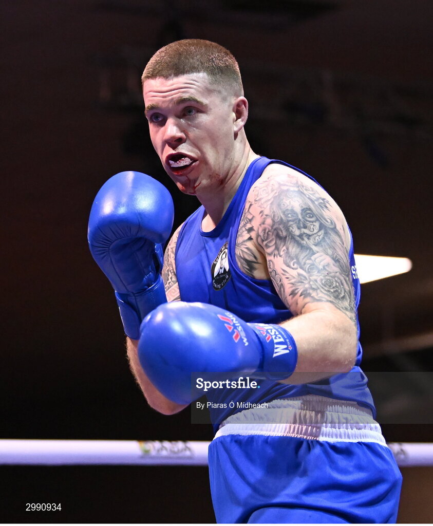 13 November 2024; Jason Clancy of Sean McDermott BC, Leitrim, in action against Ryan Collins Murphy of St Monica's BC, Newry, during the 86kg semi-final bout at the IABA National Elite Boxing Championships 2025 Finals at the National Boxing Stadium in Dublin. Photo by Piaras Ó Mídheach/Sportsfile