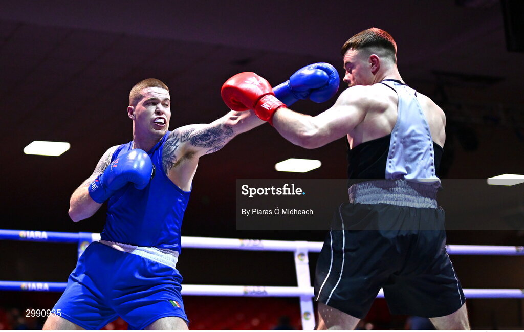 13 November 2024; Jason Clancy of Sean McDermott BC, Leitrim, left, in action against Ryan Collins Murphy of St Monica's BC, Newry, during the 86kg semi-final bout at the IABA National Elite Boxing Championships 2025 Finals at the National Boxing Stadium in Dublin. Photo by Piaras Ó Mídheach/Sportsfile