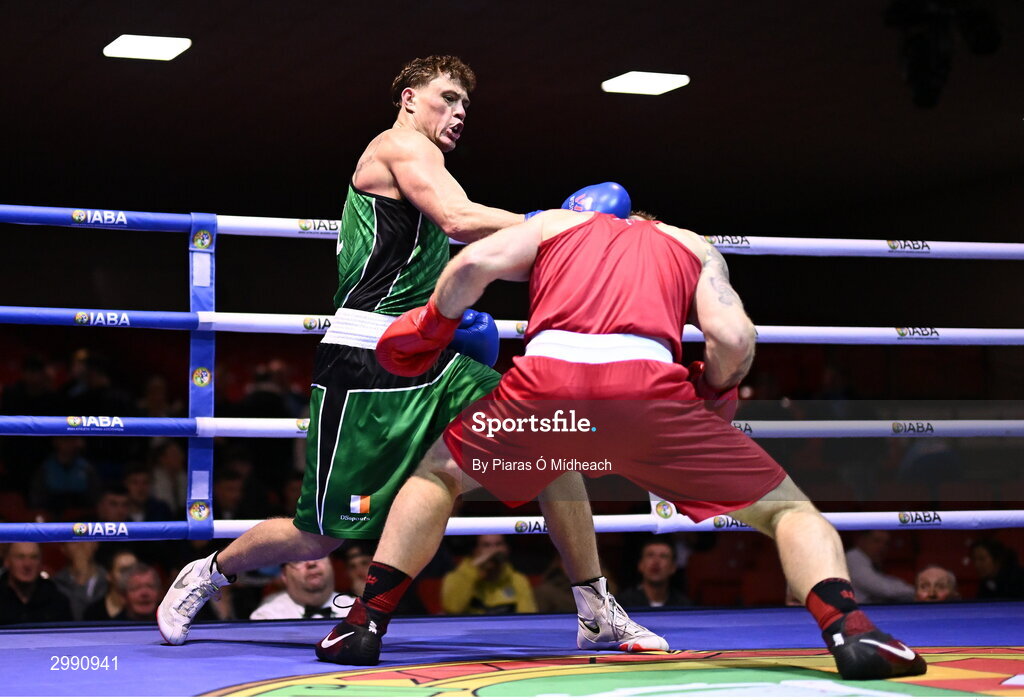 13 November 2024; Brian Kennedy of St Brigid’s Edenderry, Offaly/Defence Forces, left, in action against Shane Cunningham of Elite Cork BC during the 86kg semi-final bout at the IABA National Elite Boxing Championships 2025 Finals at the National Boxing Stadium in Dublin. Photo by Piaras Ó Mídheach/Sportsfile