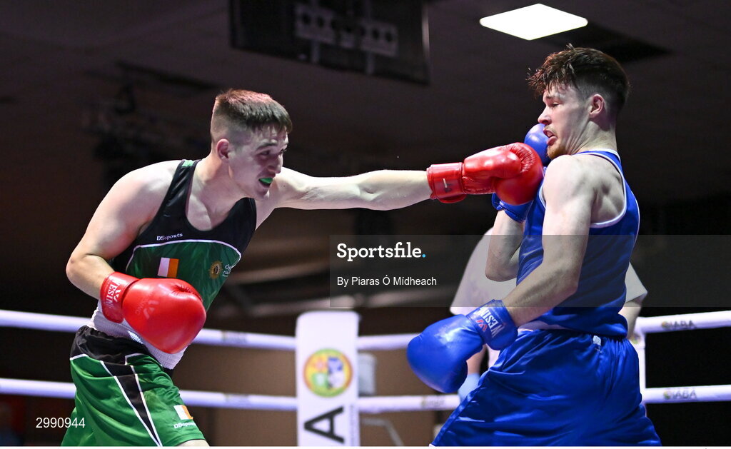 13 November 2024; TJ King of Ballyboughal/Defence Forces, left, in action against Taylor Guiney of St Mary’s BC, Dublin, during the 75kg semi-final bout at the IABA National Elite Boxing Championships 2025 Finals at the National Boxing Stadium in Dublin. Photo by Piaras Ó Mídheach/Sportsfile