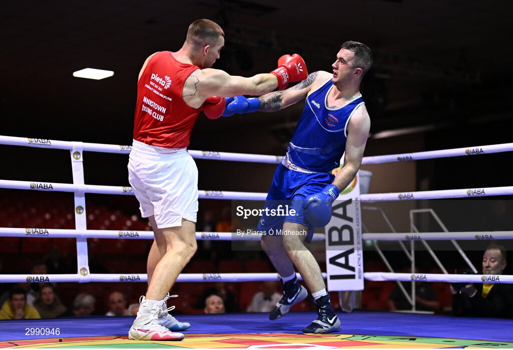 13 November 2024; Wayne Rafferty of Dublin Docklands BC, right, in action against Jack Marley of Monkstown BC, Dublin, during the 92kg semi-final bout at the IABA National Elite Boxing Championships 2025 Finals at the National Boxing Stadium in Dublin. Photo by Piaras Ó Mídheach/Sportsfile