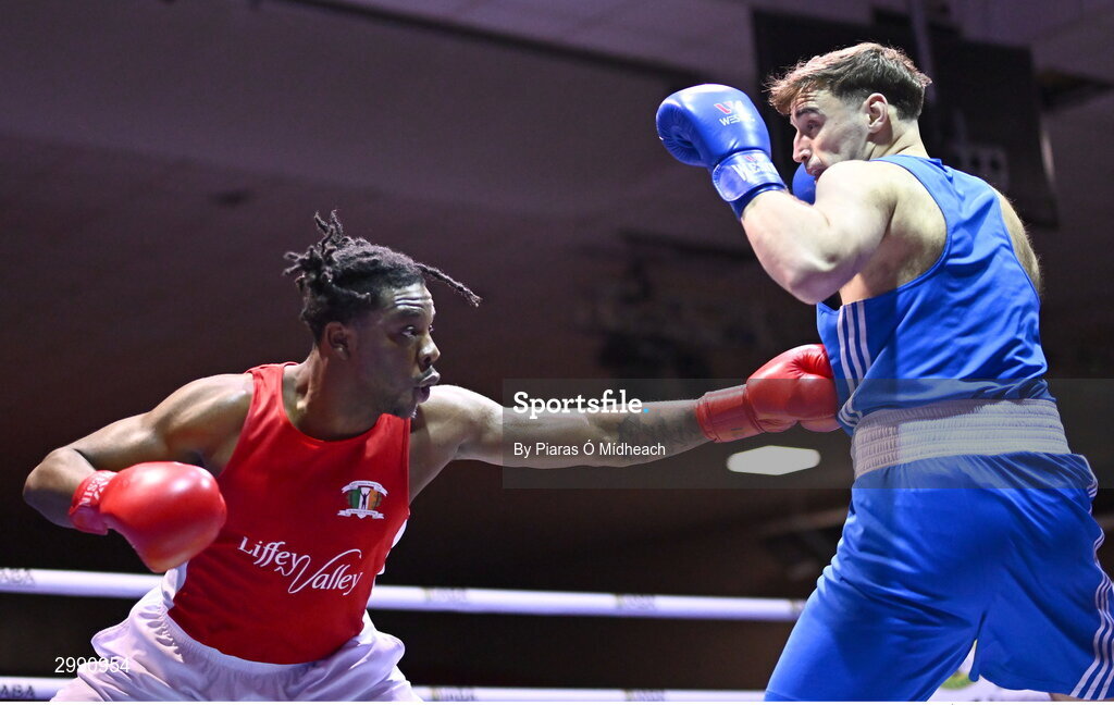 13 November 2024; Nathan Ojo of Esker BC, Dublin, left, in action against James Clarke of Crumlin BC, Dublin, during the 92kg semi-final bout at the IABA National Elite Boxing Championships 2025 Finals at the National Boxing Stadium in Dublin. Photo by Piaras Ó Mídheach/Sportsfile