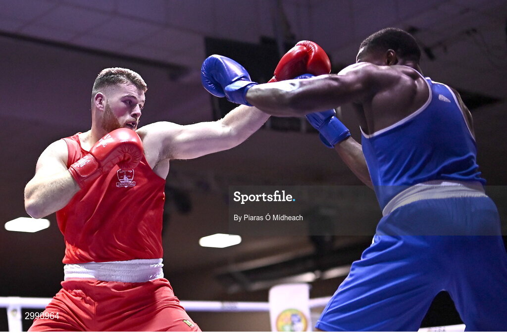 13 November 2024; Martin McDonagh of Galway BC, left, in action against Samuel Ilesanmi of St Mary’s BC, Dublin, during the 92+kg semi-final bout at the IABA National Elite Boxing Championships 2025 Finals at the National Boxing Stadium in Dublin. Photo by Piaras Ó Mídheach/Sportsfile