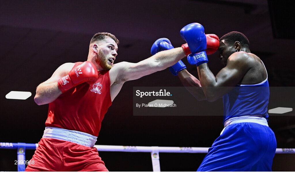 13 November 2024; Martin McDonagh of Galway BC, left, in action against Samuel Ilesanmi of St Mary’s BC, Dublin, during the 92+kg semi-final bout at the IABA National Elite Boxing Championships 2025 Finals at the National Boxing Stadium in Dublin. Photo by Piaras Ó Mídheach/Sportsfile