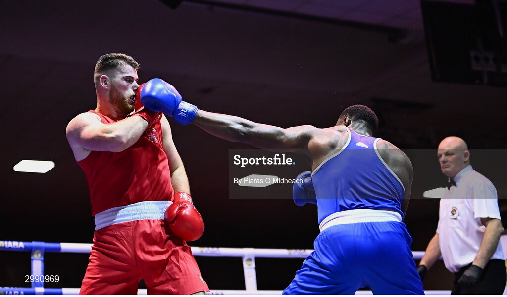 13 November 2024; Samuel Ilesanmi of St Mary’s BC, Dublin, right, in action against Martin McDonagh of Galway BC during the 92+kg semi-final bout at the IABA National Elite Boxing Championships 2025 Finals at the National Boxing Stadium in Dublin. Photo by Piaras Ó Mídheach/Sportsfile