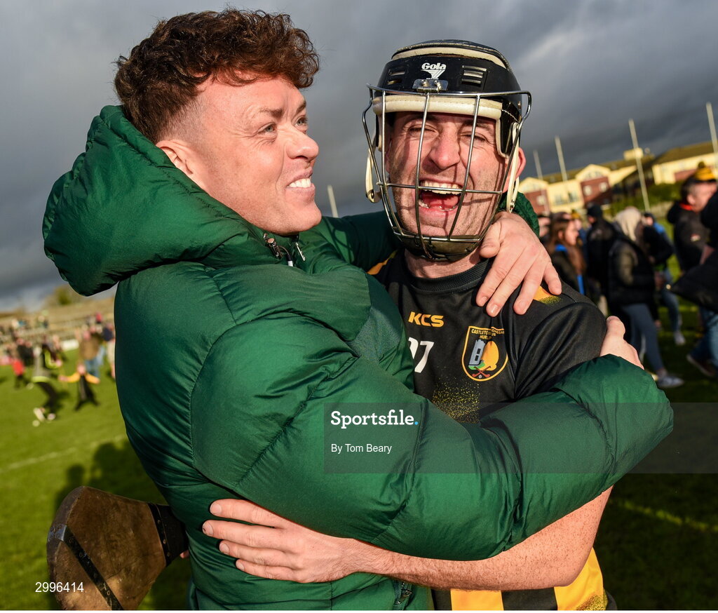 17 November 2024; Mick Heeney of Castletown Geoghegan celebrates with a supporter after his side's victory in the AIB Leinster GAA Senior Club Hurling Championship quarter-final match between Castletown Geoghegan and Thomastown at TEG Cusack Park in Mullingar, Westmeath. Photo by Tom Beary/Sportsfile