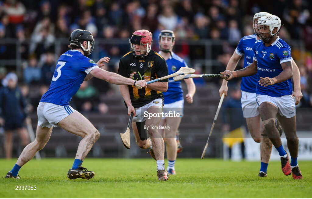 17 November 2024; Peter Clarke of Castletown Geoghegan is tackled by Jay Burke, left, and Zach Bay Hammond of Thomastown during the AIB Leinster GAA Senior Club Hurling Championship quarter-final match between Castletown Geoghegan and Thomastown at TEG Cusack Park in Mullingar, Westmeath. Photo by Tom Beary/Sportsfile
