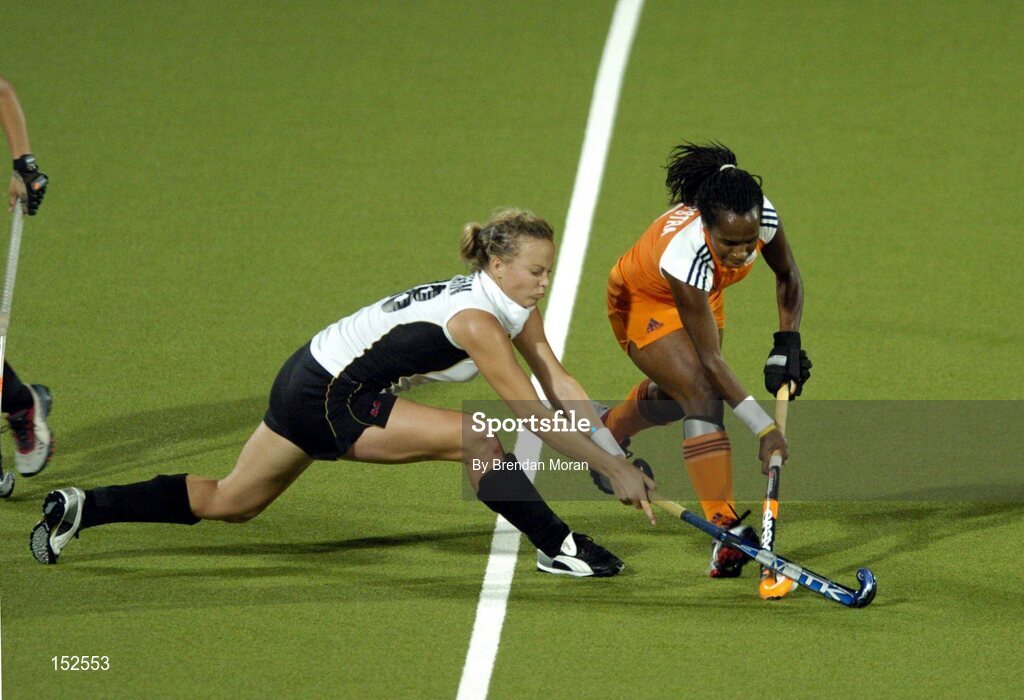 26 August 2004; Maartje Scheepstra, Netherlands, in action against Anke Kuehn, Germany. Gold Medal Match, Netherlands v Germany, Olympic Hockey Centre, Helliniko Sports Complex. Games of the XXVIII Olympiad, Athens Summer Olympics Games 2004, Athens, Greece. Picture credit; Brendan Moran / SPORTSFILE