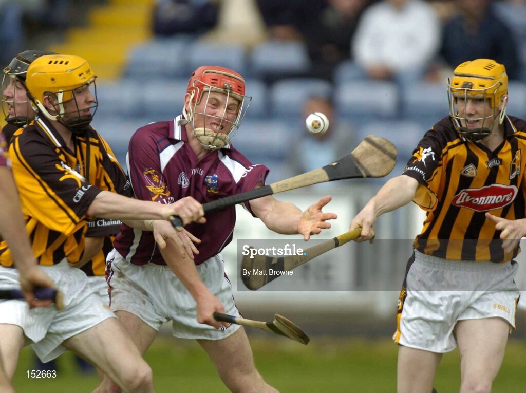 28 August 2004; David Hayes, Galway, in action against James 'Cha' Fitzpatrick, left, and Eoin Reid, Kilkenny. Erin All-Ireland U21 Hurling Championship Semi-Final, Galway v Kilkenny, O'Moore Park, Portlaoise, Co. Laois.  Picture credit; Matt Browne / SPORTSFILE