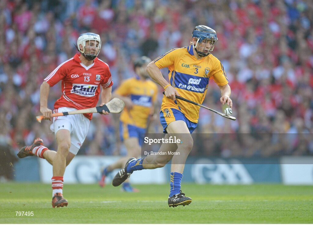 28 September 2013; David McInerney, Clare, in action against Luke O'Farrell, Cork. GAA Hurling All-Ireland Senior Championship Final Replay, Cork v Clare, Croke Park, Dublin. Picture credit: Brendan Moran / SPORTSFILE
