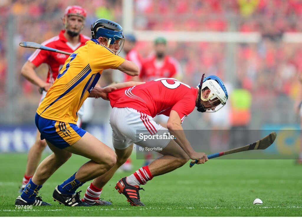 28 September 2013; Luke O'Farrell, Cork, in action against David McInerney, Clare. GAA Hurling All-Ireland Senior Championship Final Replay, Cork v Clare, Croke Park, Dublin. Photo by Sportsfile