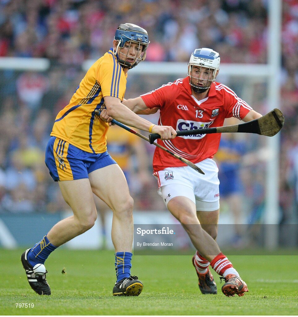 28 September 2013; Luke O'Farrell, Cork, in action against David McInerney, Clare. GAA Hurling All-Ireland Senior Championship Final Replay, Cork v Clare, Croke Park, Dublin. Picture credit: Brendan Moran / SPORTSFILE