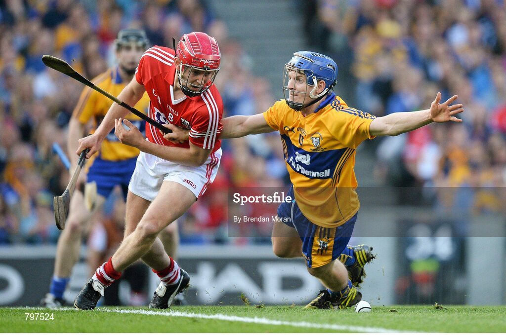 28 September 2013; Lorcan McLoughlin, Cork, in action against Pádraic Collins, Clare. GAA Hurling All-Ireland Senior Championship Final Replay, Cork v Clare, Croke Park, Dublin. Picture credit: Brendan Moran / SPORTSFILE